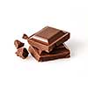 Macro photo  of Chocolate bar. Broken pieces over white background