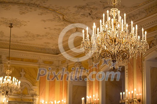 Chrystal chandelier in a splendid baroque room Chrystal chandelier in a splendid baroque room