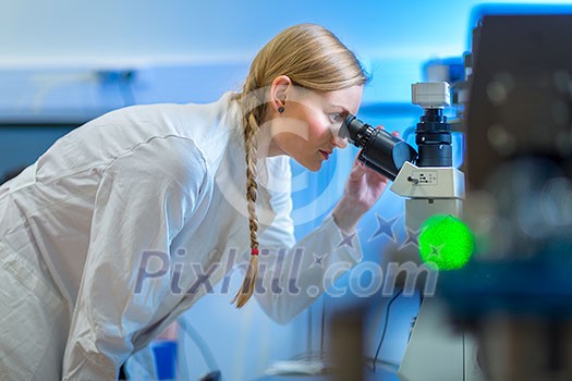 Portrait of a female researcher carrying out research in a chemistry lab (color toned image; shallow DOF) Portrait of a female researcher carrying out research in a chemistry lab (color toned image; shallow DOF)