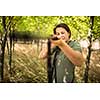 Autumn hunting season. Hunting. Outdoor sports. Woman hunter in the woods