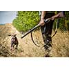Autumn hunting season. Hunting. Outdoor sports. Woman hunter in the woods