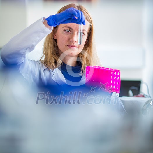 Portrait of a female researcher doing research in a lab (shallow DOF; color toned image) Portrait of a female researcher doing research in a lab (shallow DOF; color toned image)