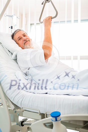 Senior male patient in a modern hospital (shallow DOF; color toned image) Senior male patient in a modern hospital (shallow DOF; color toned image)