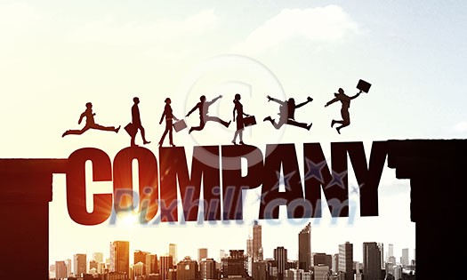 Team of business people running on company word bridge over precipice Team of business people running on company word bridge over precipice