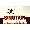 Businessman running on solution word bridge over precipice