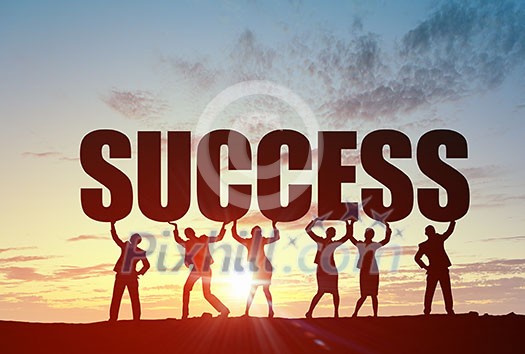 Business people lifting word success representing collaboration concept Business people lifting word success representing collaboration concept