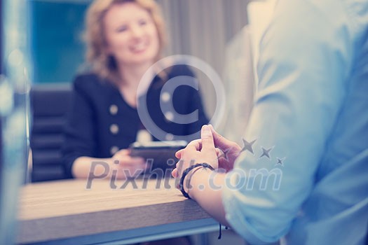 Group of a young business people discussing business plan at modern startup office building Group of a young business people discussing business plan at modern startup office building