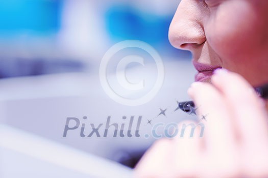 young smiling female call centre operator doing her job with a headset young smiling female call centre operator doing her job with a headset