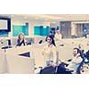 group of young business people with headset working and giving support to customers in a call center office