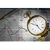Pocket watch and business concepts on digital background