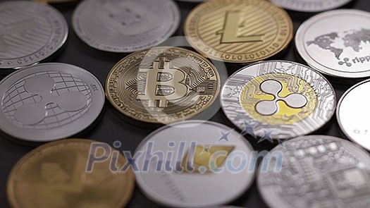Physical metal cryptocurrency on a dark background. Digital coins cyberspace. Playing light on coins Bitcoin, Monero, Litecoin, Ethereum, Ripple, Dash flashes and fading. Slow motion. 1080p Full HD video Physical metal cryptocurrency on a dark background. Digital coins cyberspace. Playing light on coins Bitcoin, Monero, Litecoin, Ethereum, Ripple, Dash flashes and fading. Slow motion. 1080p Full HD video