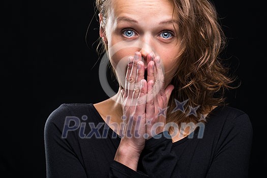 Beauty portrait of a beautiful female model (color toned image) expressing surprise Beauty portrait of a beautiful female model (color toned image) expressing surprise