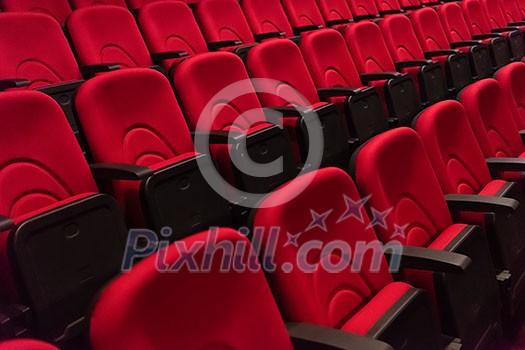 empty conference,theater or cinema hall with rows of red seats empty conference,theater or cinema hall with rows of red seats