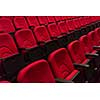 empty conference,theater or cinema hall with rows of red seats