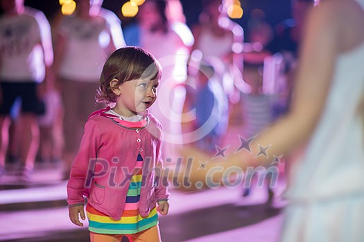 little cute girl carefully spending time while dancing in the kids disco little cute girl carefully spending time while dancing in the kids disco