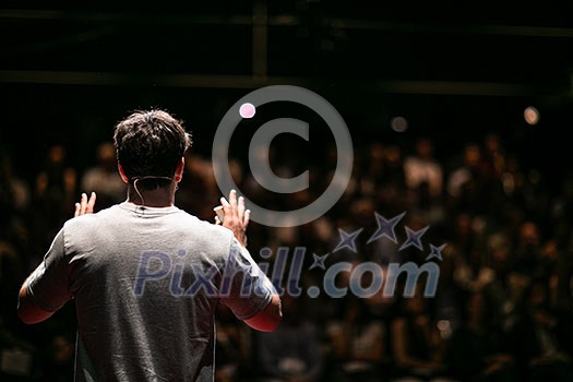 Speaker giving a talk on corporate Business Conference. Audience at the conference hall. Business and Entrepreneurship event. Speaker giving a talk on corporate Business Conference. Audience at the conference hall. Business and Entrepreneurship event.