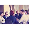 startup business people group have meeting in modern bright office interior, senoir investors  and young software  developers