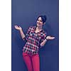 portrait of young startup business woman at modern office, grey chalkboard wall in background