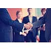 business partners, partnership concept with two businessman handshake