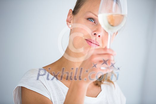 Gorgeous young woman with a glass of wine, smelling the lovely drink, savouring every sip (shallow DOF; color toned image) Gorgeous young woman with a glass of wine, smelling the lovely drink, savouring every sip (shallow DOF; color toned image)
