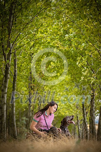 Autumn hunting season. Hunting. Outdoor sports. Woman hunter in the woods Autumn hunting season. Hunting. Outdoor sports. Woman hunter in the woods