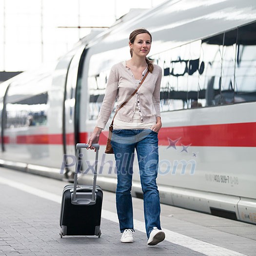 Pretty young woman at a train station Pretty young woman at a train station