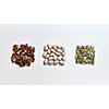 A set of nuts and seeds, natural ingredients for healthy vegetarian natural eating on a white background. Healthy energy vegan snack. Flat lay