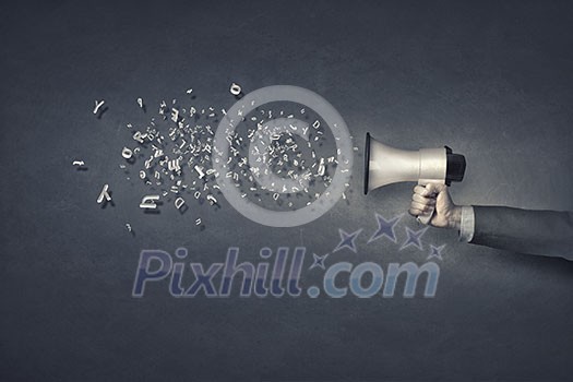Businessman hand with loudspeaker and characters flying out Businessman hand with loudspeaker and characters flying out