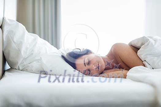 Beautiful young woman sleeping on bed at bedroom Beautiful young woman sleeping on bed at bedroom