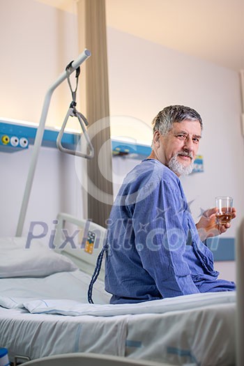 Senior male patient in a modern hospital (shallow DOF; color toned image)