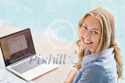 Businesswoman working with laptop in offfice Businesswoman working with laptop in offfice