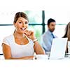 Young attractive businesswoman in office
