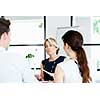 Business woman discussing new project with her partners