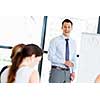 Businessman doing a presentaion in front of his collegues