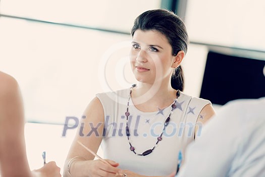 Businesswoman having discussion with collegues Businesswoman having discussion with collegues
