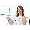 Young attractive businesswoman in office