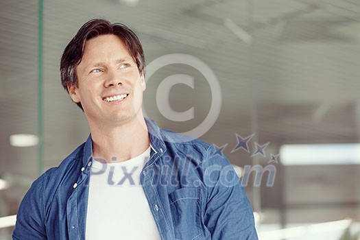 Portrait of a handsome young man in an office Portrait of a handsome young man in an office