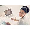 Businesswoman working with laptop in offfice