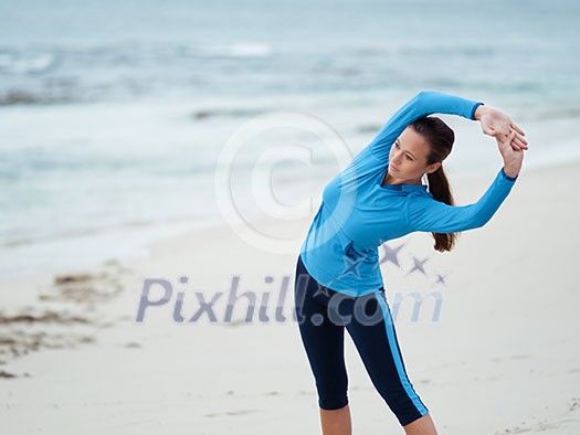 Sporty young woman on the sea coast Sporty young woman on the sea coast