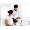 Two collegues working together in an office