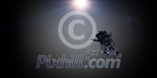 Astronaut in space over Earth planet. Elements of this image furnished by NASA. Mixed media Astronaut in space over Earth planet. Elements of this image furnished by NASA. Mixed media