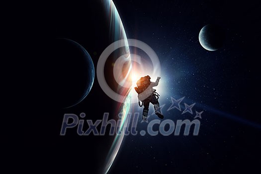 Astronaut in space over Earth planet. Elements of this image furnished by NASA. Mixed media Astronaut in space over Earth planet. Elements of this image furnished by NASA. Mixed media