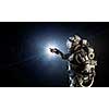 Woman astronaut in space touching planet. Elements of this image furnished by NASA