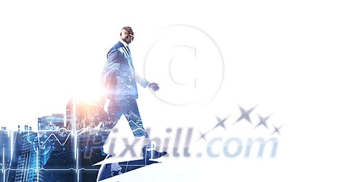 Afroamerican businessman walking with suitcase in hand Afroamerican businessman walking with suitcase in hand