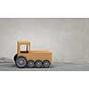 Cardboard train with nobody on concrete background. Mixed media