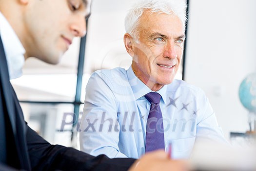 Business peoplehaving meeting in office Business peoplehaving meeting in office