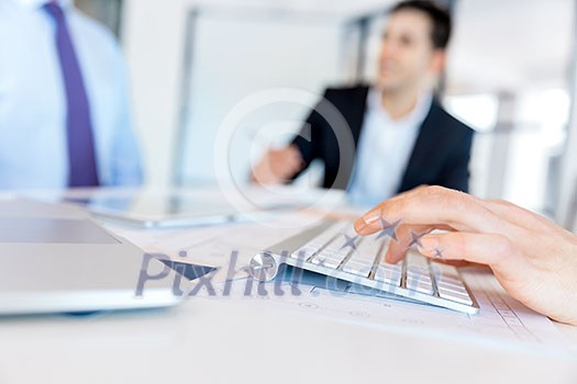 Image of woman's hands typing. Selective focus Image of woman's hands typing. Selective focus