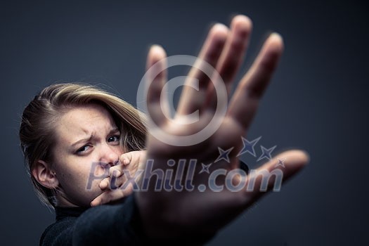 Young woman being a domestic violence victim Young woman being a domestic violence victim