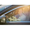 Pretty, young woman  driving a car -Invitation to travel. Car rental or vacation.