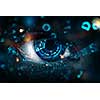 close up of eye with blue digital iris and digital code around